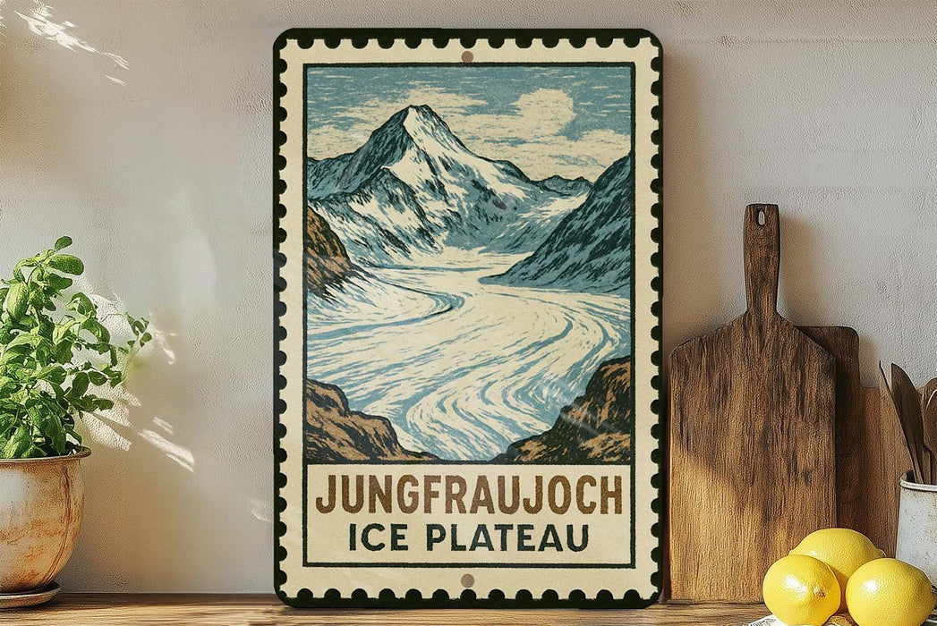 A framed illustration of a mountain landscape with a river, accompanied by the text "Jungfraujoch ICE PLATEAU" on a wooden shelf.