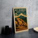 A vintage-style metal sign for Mount Diablo Rock City in California, featuring a landscape with mountains, rocks, and a cloudy sky.