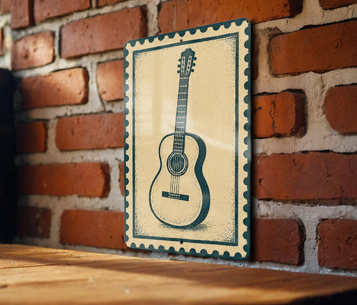 A metal sign with a guitar illustration is mounted on a brick wall.