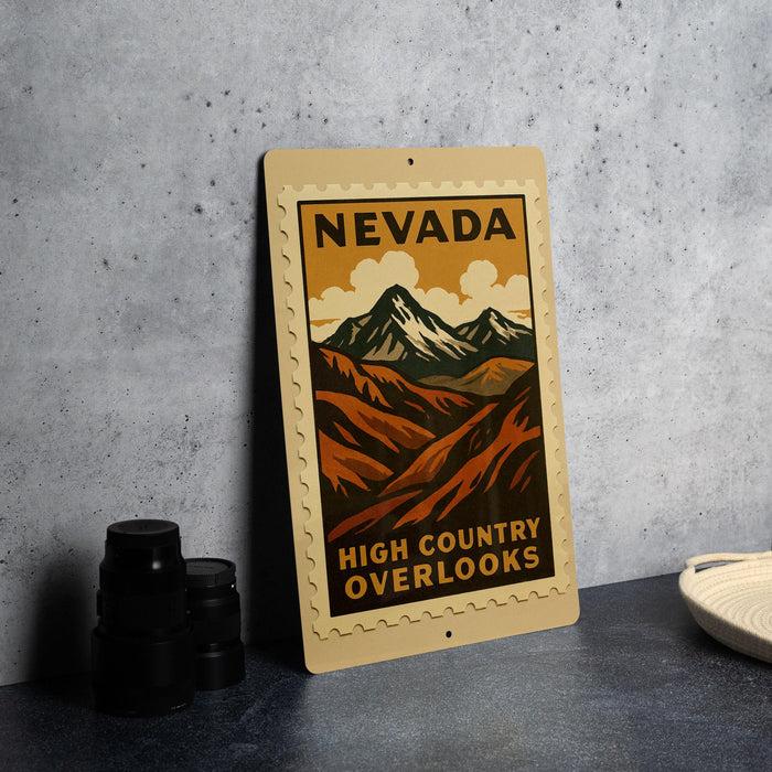 A vintage-style metal sign with the text "NEVADA HIGH COUNTRY OVERLOOKS" is displayed on a gray concrete surface, accompanied by a stack of black camera lenses and a white dish.