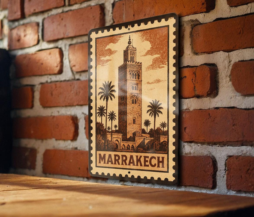 A metal sign with a picture of a tower and palm trees, mounted on a brick wall.