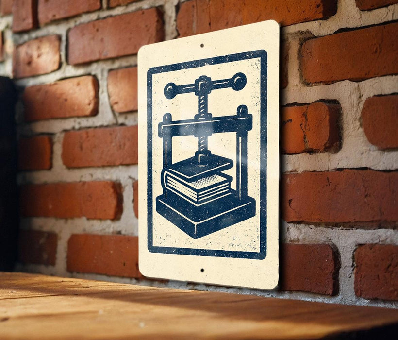 a sign with a black and white illustration of a book press, mounted on a brick wall.