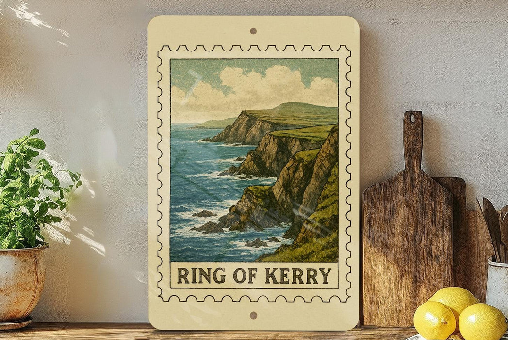 A framed print of a coastal landscape with cliffs and the ocean is displayed on a shelf, accompanied by kitchen utensils and a potted plant.