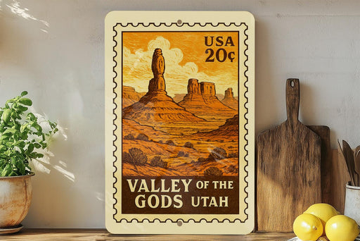 A framed vintage-style illustration of the Valley of the Gods in Utah, featuring a desert landscape with mountains and rock formations.