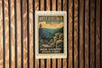 A vintage-style poster of West Virginia's High Country overlooks is displayed on a wooden wall.