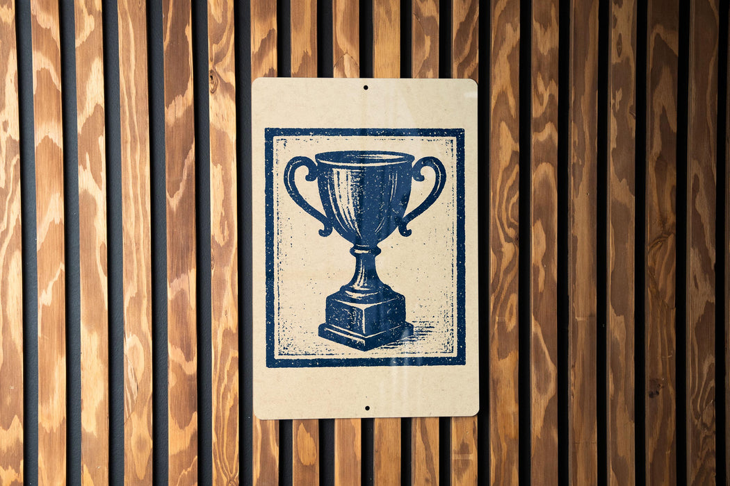 A blue and white sign with a trophy icon is mounted on a wooden wall.