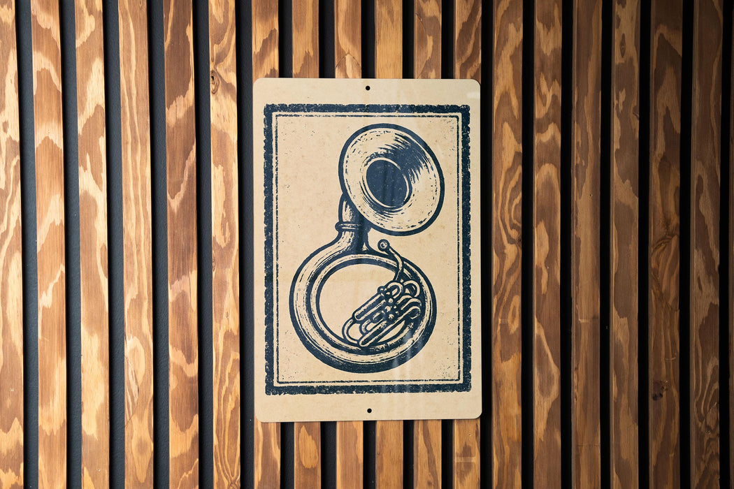 a brass instrument, specifically a tuba, which is depicted on a sign.