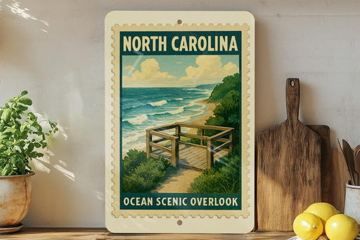 A framed poster of the North Carolina Ocean Scenic overlook, featuring a wooden deck overlooking the ocean and a cloudy sky.