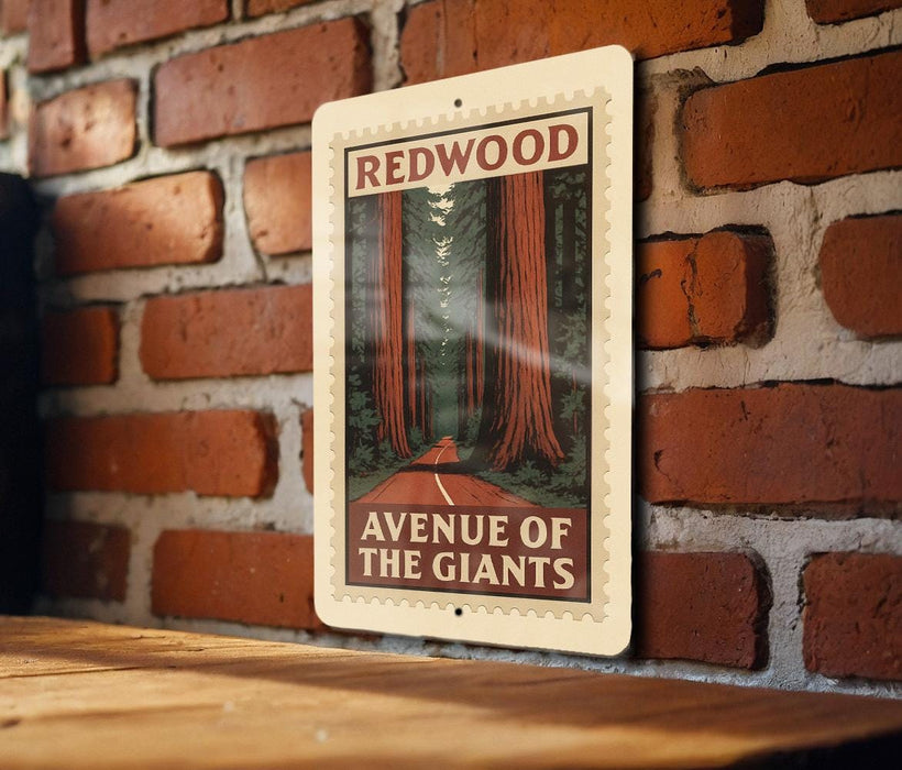 A vintage-style metal sign with the text "REDWOOD AVENUE OF THE GIANTS" is mounted on a brick wall.