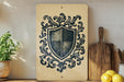 a wooden cutting board with a decorative shield design on it, placed on a shelf next to a potted plant and some lemons.