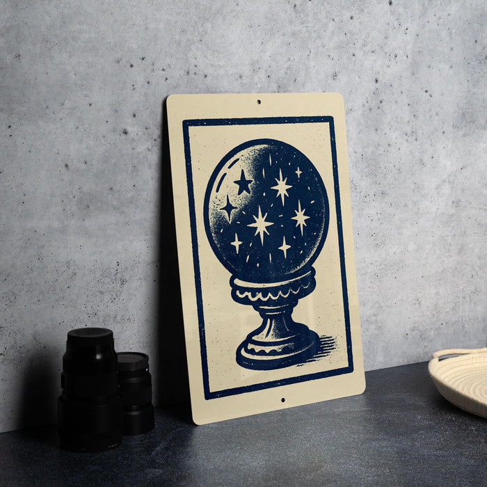 a sign with a blue and white design depicting a starry sky on a beige background.