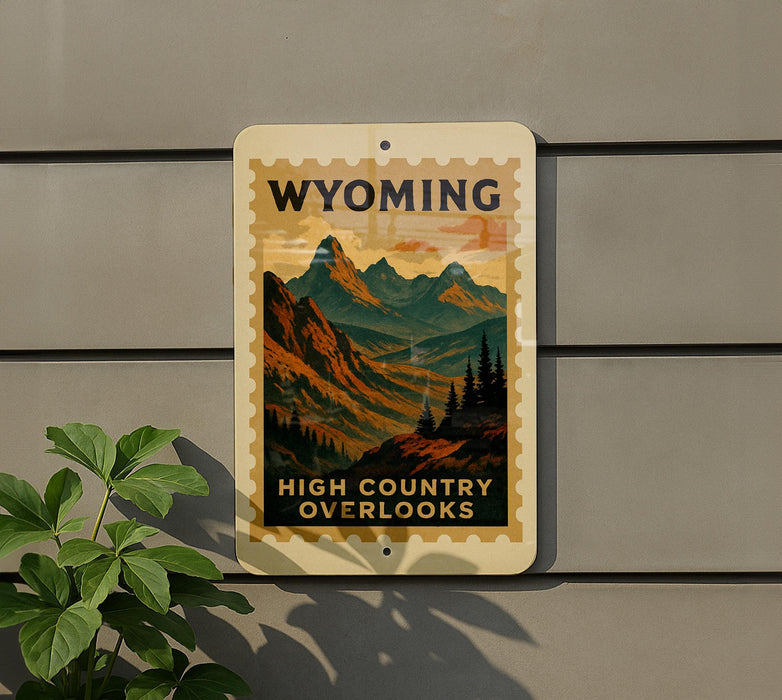 A sign for Wyoming High Country Overlooks is displayed on a wall, featuring a scenic mountain landscape.