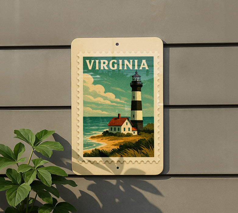 A vintage-style postage stamp depicting a lighthouse and coastal landscape, mounted on a wall.