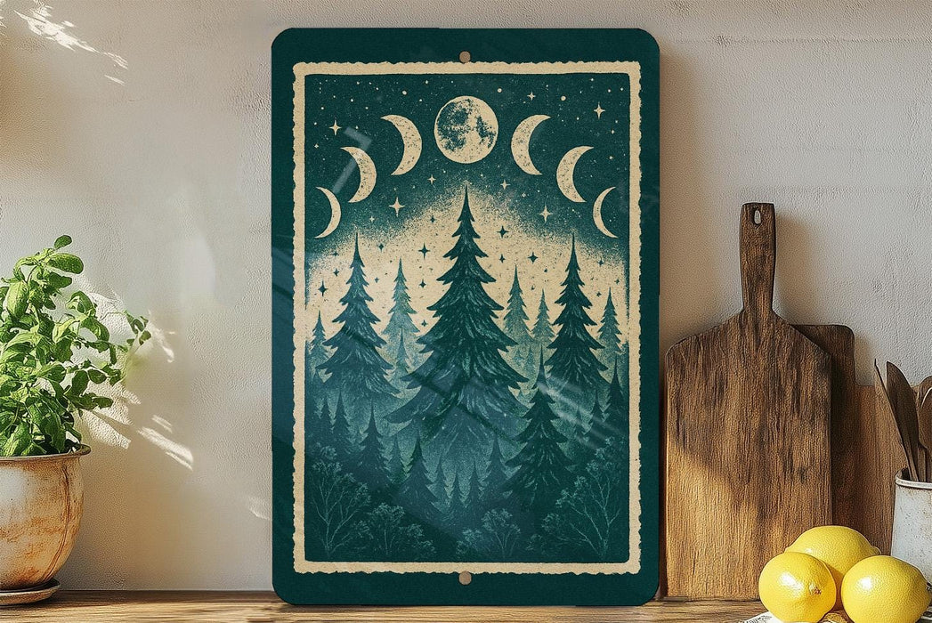 a framed illustration of a forest scene with pine trees and a crescent moon, displayed on a shelf next to a wooden cutting board and a potted plant.