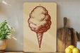 a wooden shelf with various items, including a potted plant, a wooden cutting board, and a sign depicting a cotton candy cone.