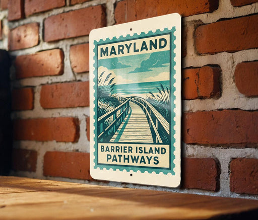 A metal sign with a graphic of a wooden walkway and the text "BARRIER ISLAND PATHWAYS" is mounted on a brick wall.