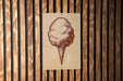 a sign with a drawing of a cotton candy cone.