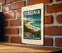 A vintage-style poster of the Ocean Scenic overlook in Virginia, featuring a scenic view of the ocean and a wooden walkway leading to the overlook.