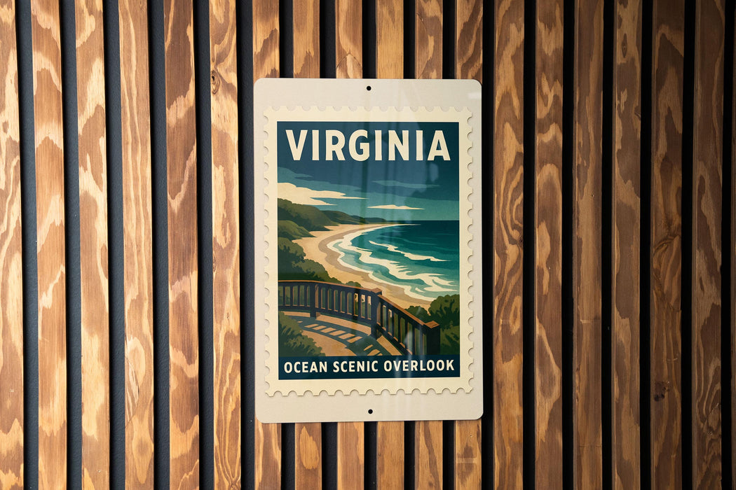 A vintage-style poster of the ocean, featuring a scenic overlook, is displayed on a wooden wall.