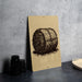 a sign with a drawing of a hay bale on it, placed on a table next to some black camera lenses.