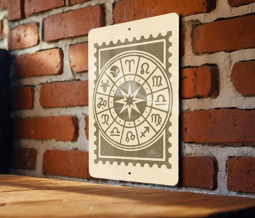 a sign with astrological symbols on it, mounted on a brick wall.