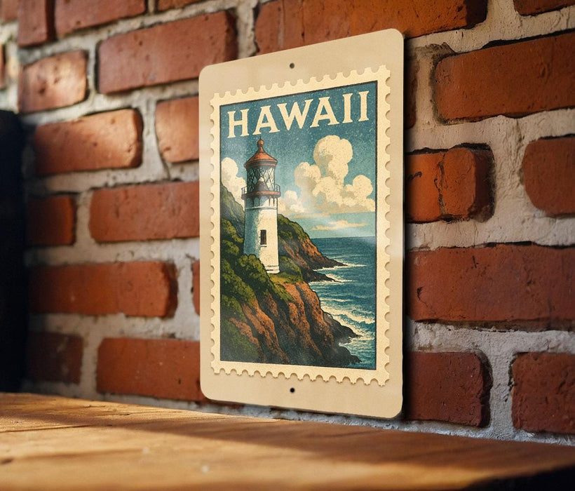 A framed vintage postage stamp depicting a lighthouse on a cliff overlooking the ocean, mounted on a brick wall.