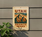 A sign for the Granite Peaks in Utah, featuring a mountain illustration and the text "UTAH GRANITE PEAKS".