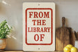 a sign that reads "FROM THE LIBRARY OF"