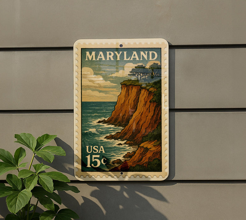A framed postage stamp depicting a scenic coastal landscape in Maryland, with the text "MARYLAND" and "USA 15¢" printed on it.