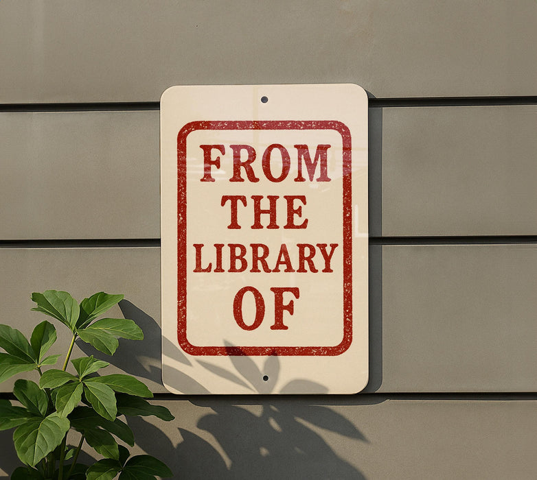 a sign that reads "FROM THE LIBRARY OF"