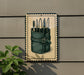a sign with a picture of a knife case containing multiple knives.