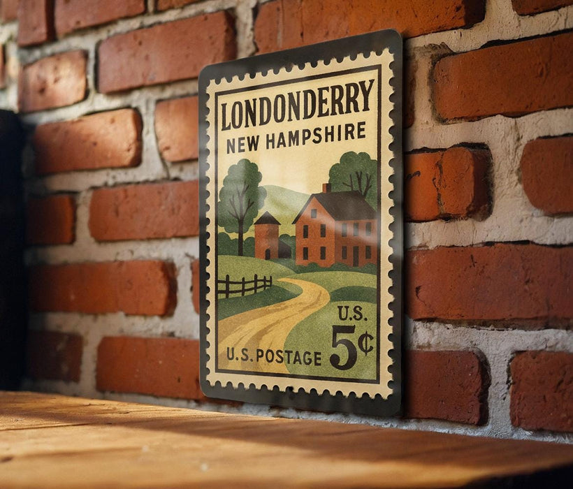 A vintage-style postage stamp from the United States, featuring a rural scene with a house, road, and trees, mounted on a brick wall.