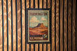 A U.S. postage stamp from Farmington, New Mexico, featuring a mountain landscape.