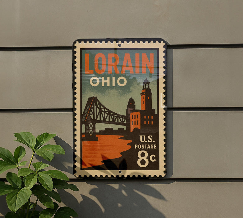 A vintage postage stamp from the United States, featuring an illustration of a bridge and buildings, mounted on a wall.