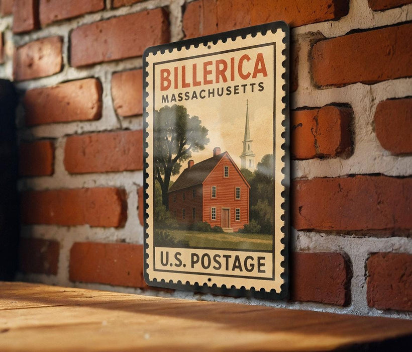 A vintage-style postage stamp featuring a red brick wall and a red brick building, with the text "BILLERICA MASSACHUSETTS U.S. POSTAGE" printed on it.