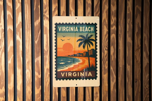 A vintage-style poster of Virginia Beach, featuring a palm tree, sunset, and ocean waves, is displayed on a wooden wall.