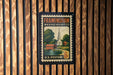 Framingham, Massachusetts postage stamp on a wooden wall.
