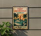 A vintage U.S. postage stamp from Fort Lauderdale, Florida, featuring a tropical cityscape with palm trees and a boat on the water.