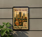 A framed postage stamp depicting Winston-Salem, North Carolina, with a cityscape and church spire.