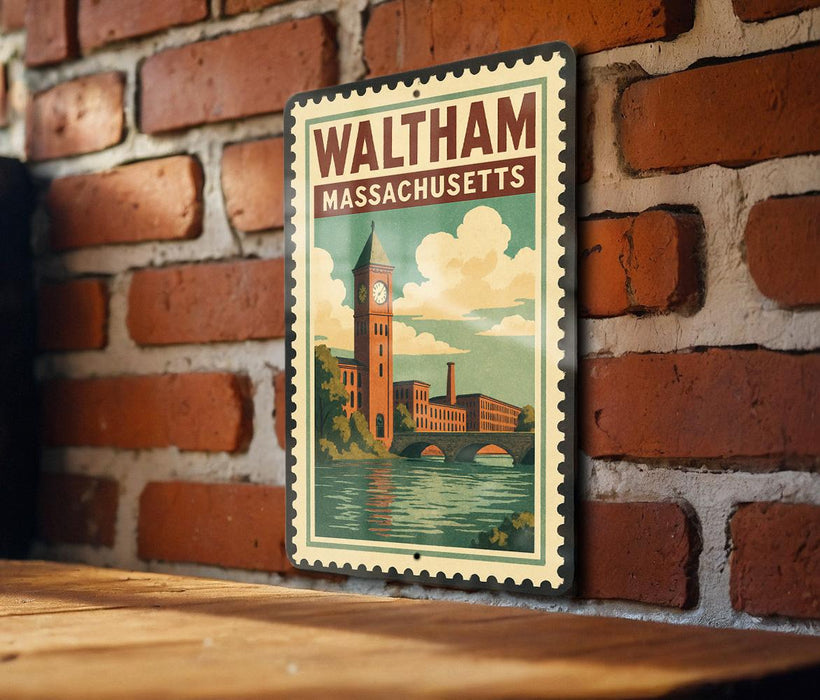 A vintage-style metal sign with the text "WALTHAM MASSACHUSETTS" and an illustration of a clock tower and a bridge, mounted on a brick wall.