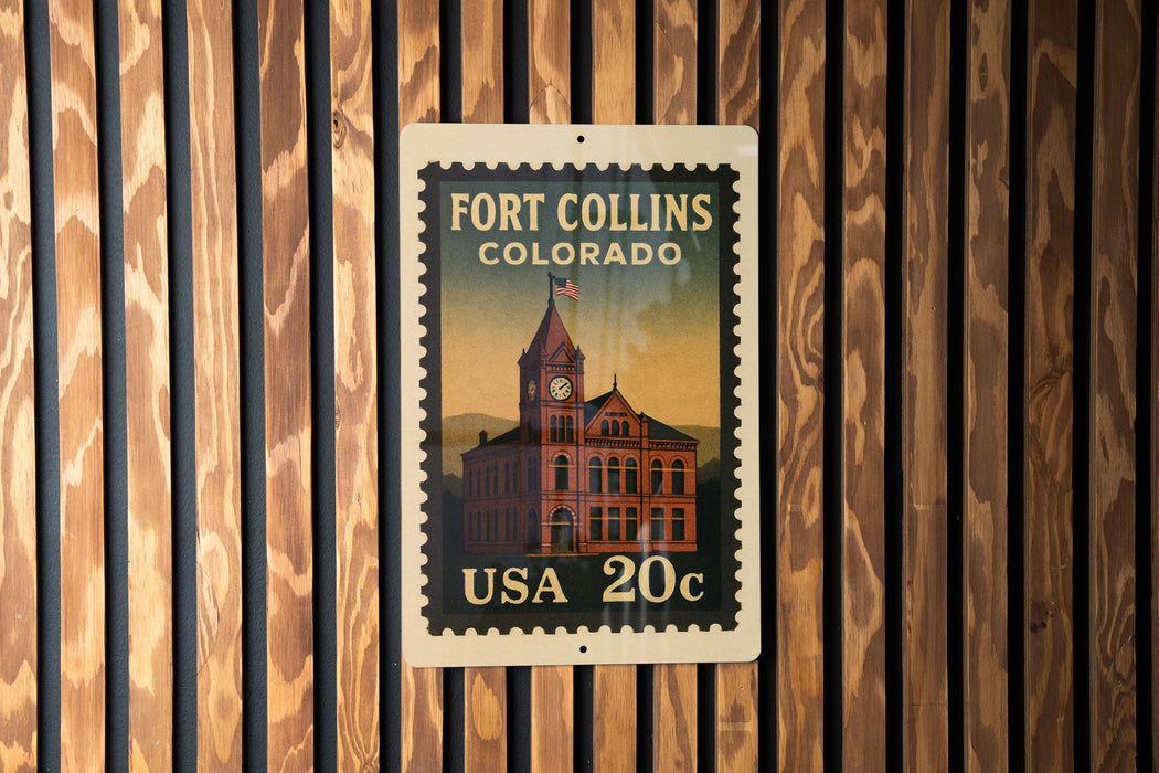 A 20 cent US postage stamp from Fort Collins, Colorado, featuring a building with a clock tower.