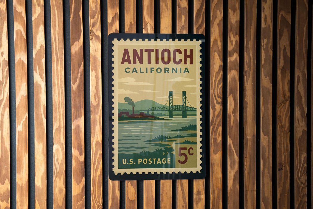 A vintage postage stamp from the United States of America, featuring a scenic illustration of a bridge and water.