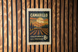 A postage stamp from California, featuring a scenic landscape with a sunset over a field.