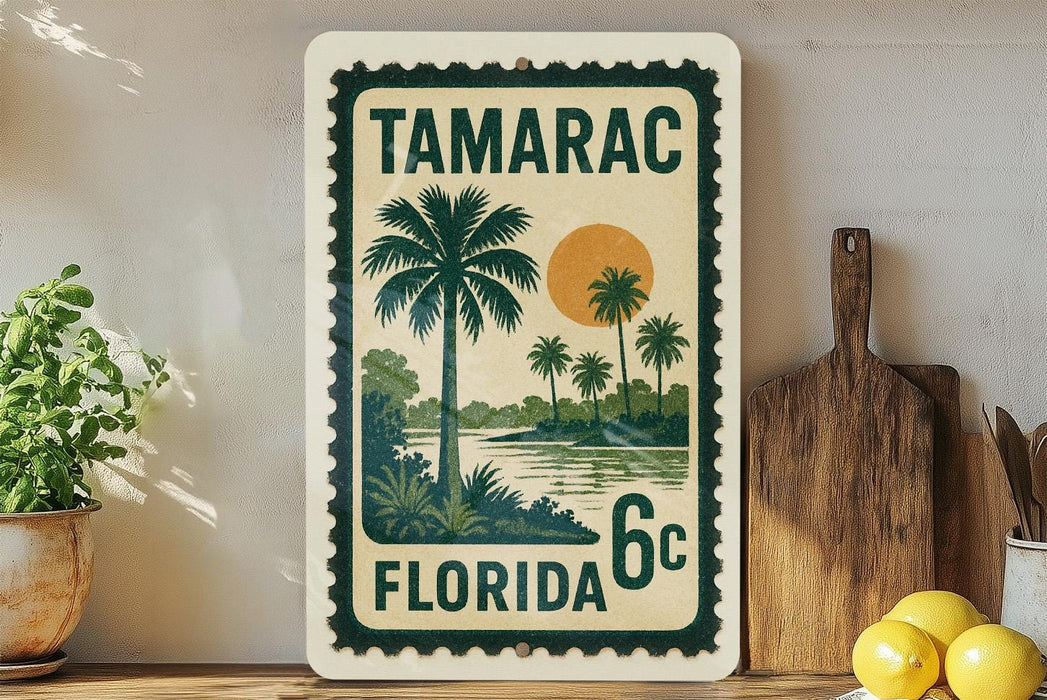 A vintage-style stamp depicting a tropical landscape with palm trees, a sun, and a body of water, with the text "TAMARAC FLORIDA 6c".