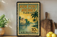 A vintage-style postage stamp from New Port Richey, Florida, featuring a tropical landscape with palm trees and a building on the water.