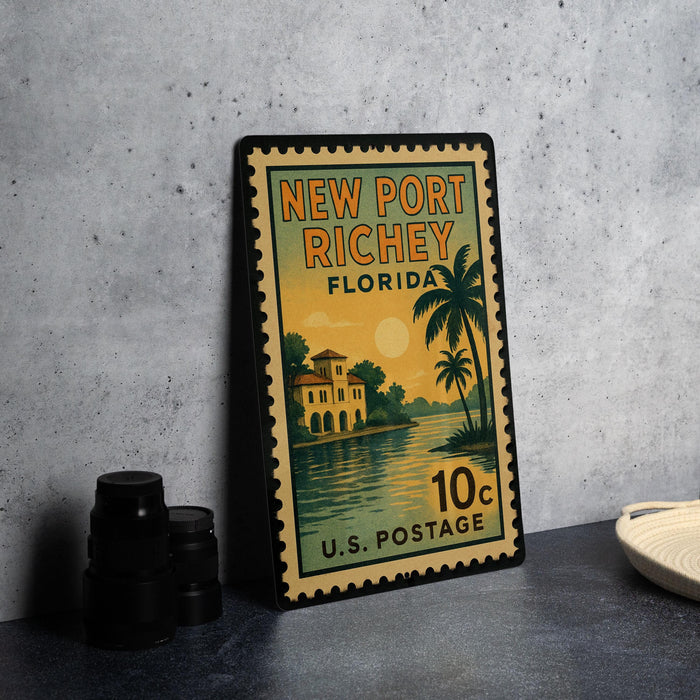A vintage-style postage stamp from New Port Richey, Florida, featuring a tropical island landscape with palm trees and a building.