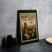 A framed poster of Montclair, New Jersey, featuring an illustration of the town's architecture and landscape.
