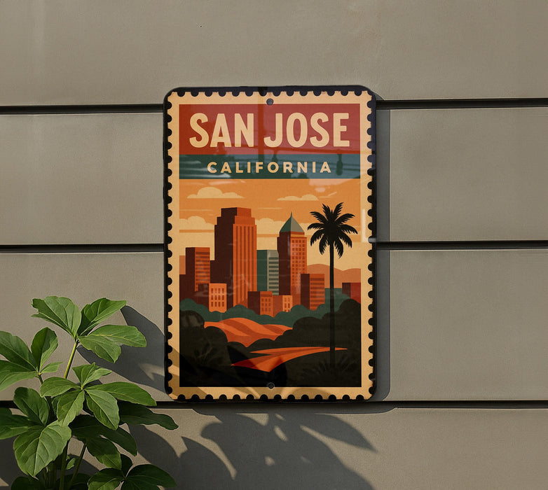 A vintage-style poster of San Jose, California, featuring a cityscape with palm trees and buildings, mounted on a wall.