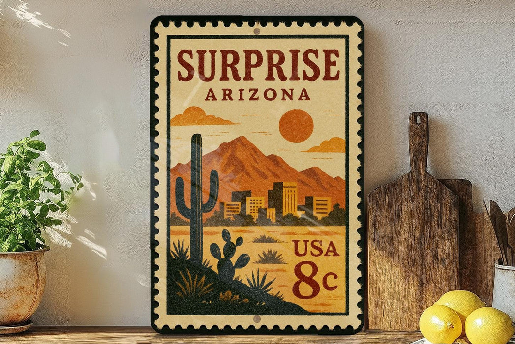 A vintage-style postage stamp from Arizona, featuring a desert landscape with mountains, cacti, and buildings, along with the text "Surprise Arizona USA 8c".