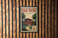 A vintage-style postage stamp depicting a house in Illinois, with the text "OAK PARK ILLINOIS" prominently displayed.